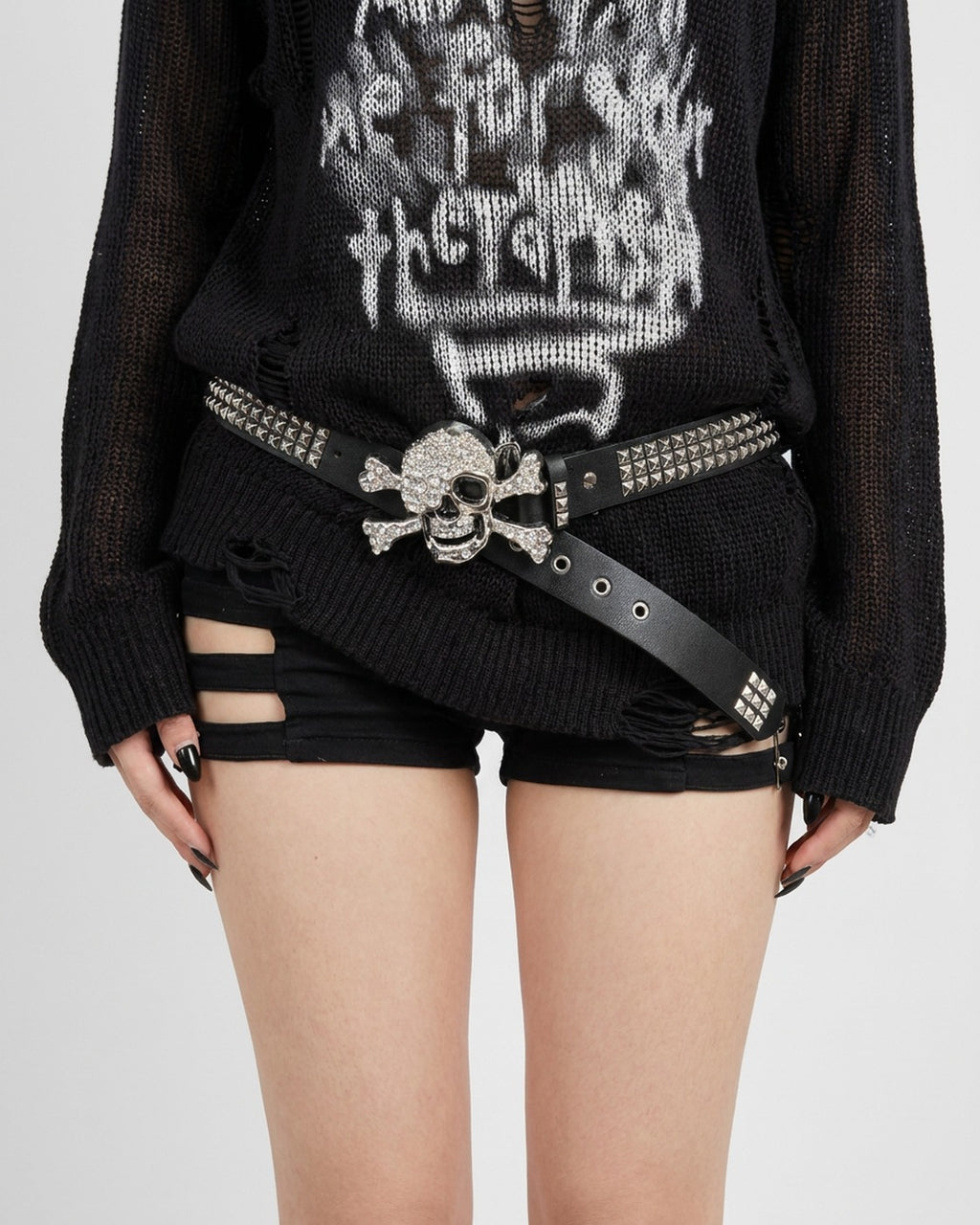 Rhinestone Skull Crossbones Belt worn – black studded belt with rhinestone skull and crossbones buckle styled in a streetwear outfit