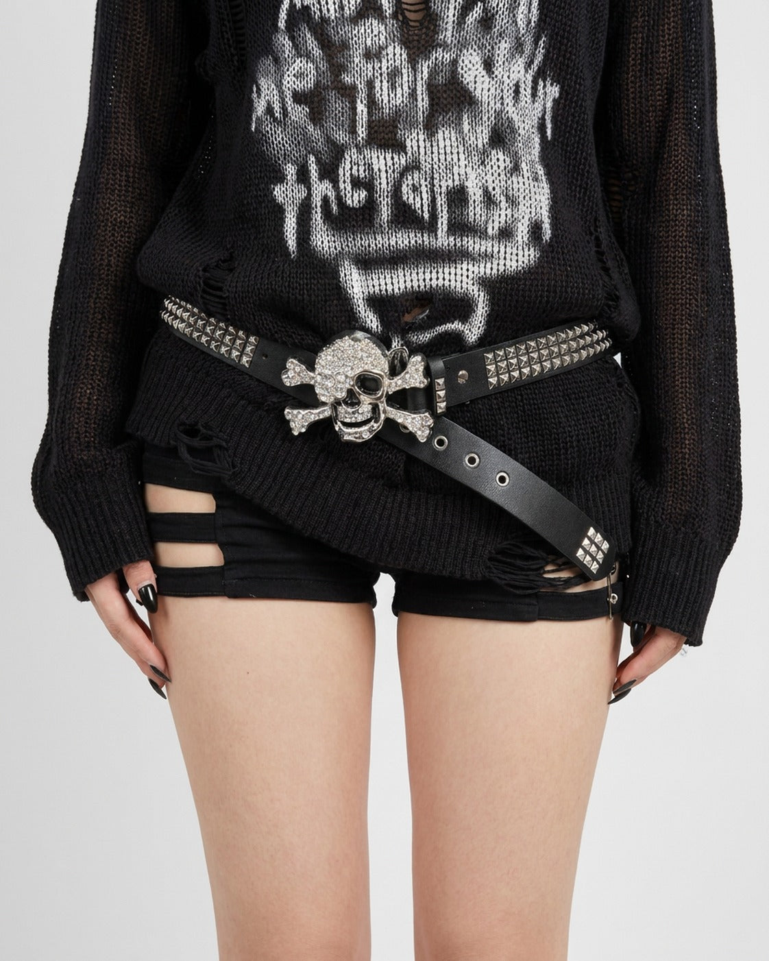 Rhinestone Skull Crossbones Belt worn – black studded belt with rhinestone skull and crossbones buckle styled in a streetwear outfit