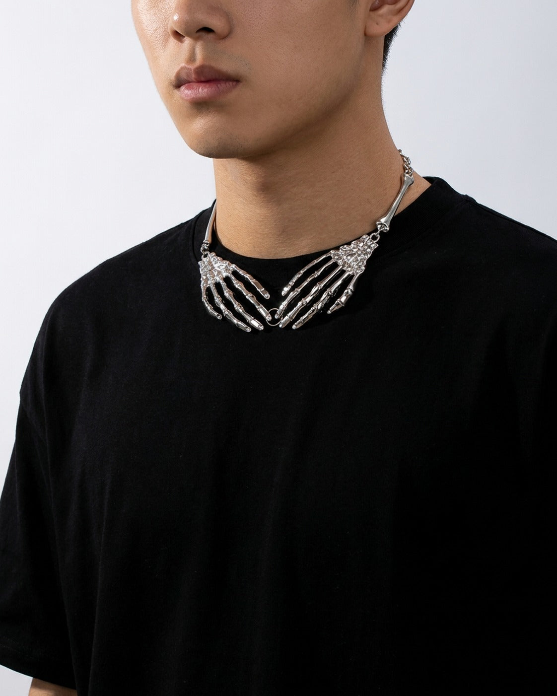 Skeleton Hand Claw Necklace – skeleton hand claw necklace, close-up detail