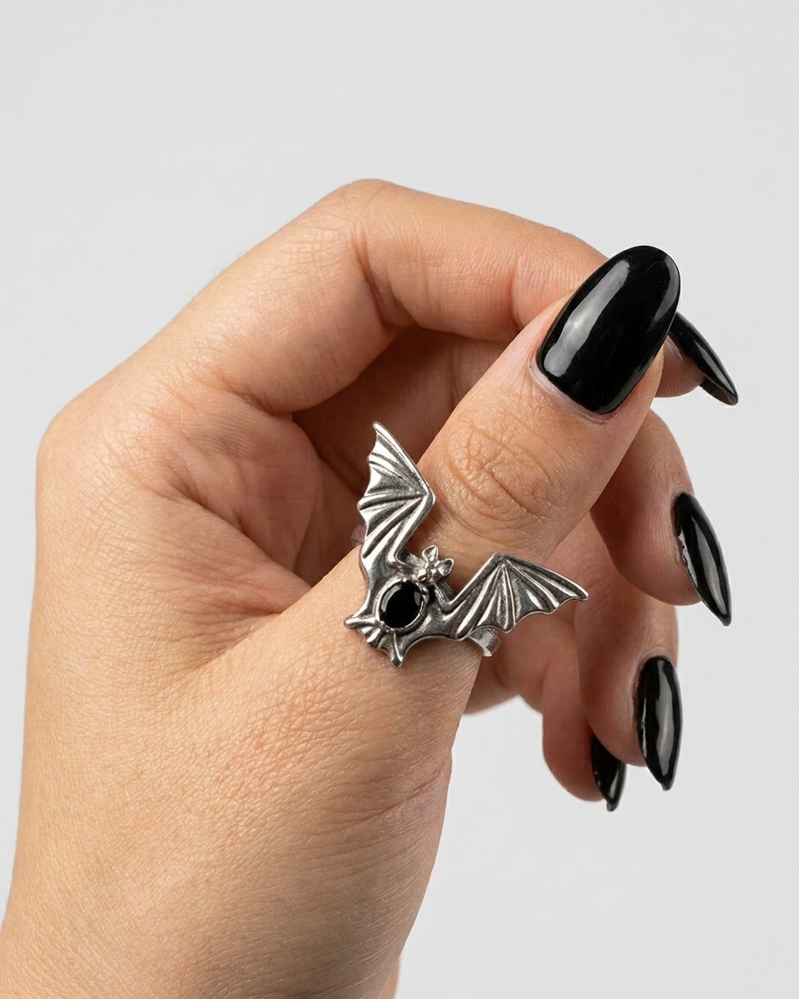 Bat Wing Ring worn on the finger – unisex gothic ring styled with streetwear