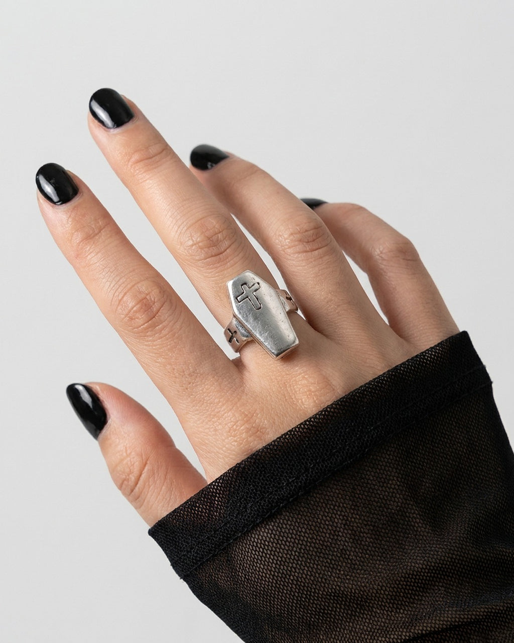 Coffin Cross Ring worn on the finger – unisex gothic ring styled with streetwear