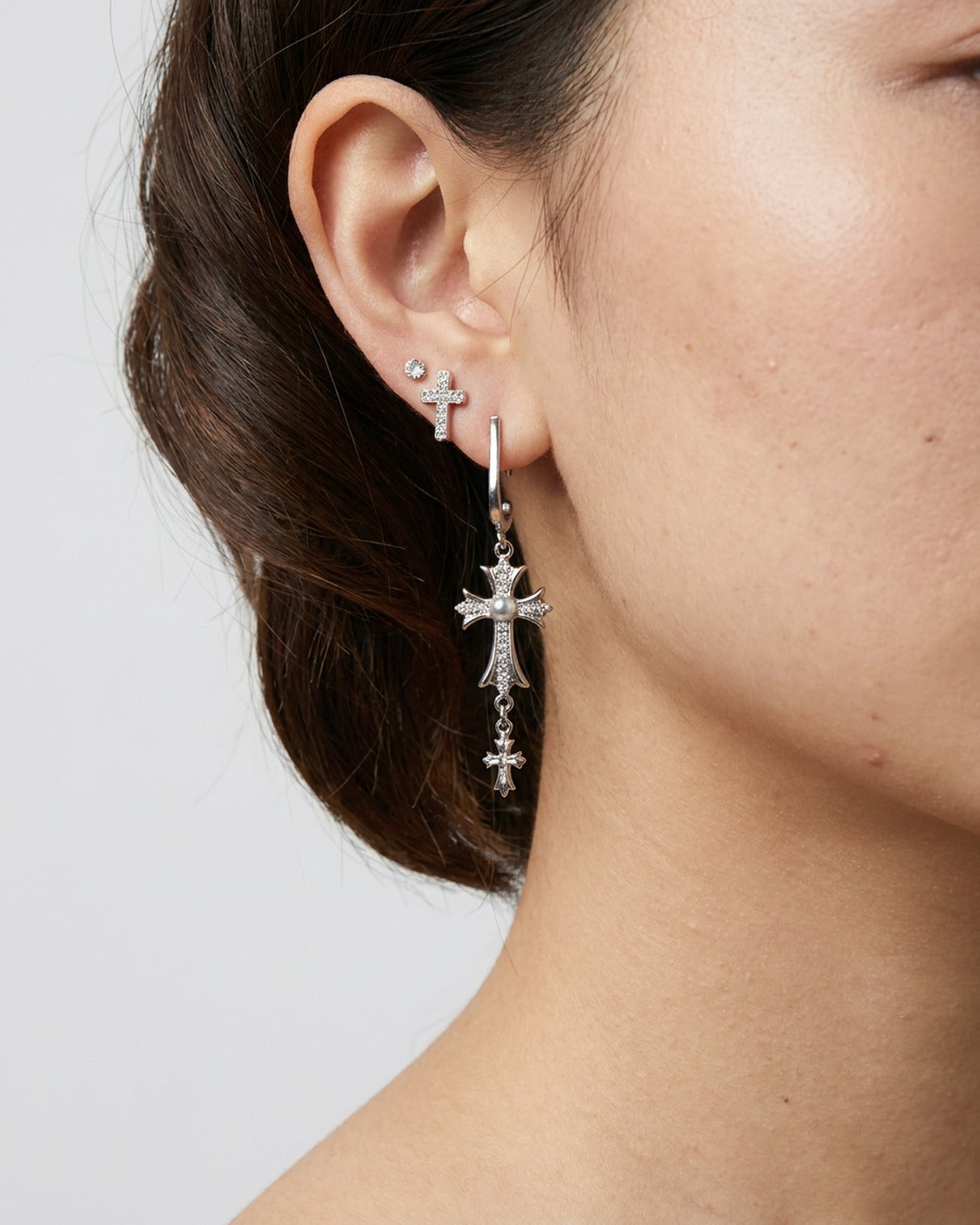 Rhinestone Cross Drop Earrings worn – mismatched rhinestone cross stud and drop earrings