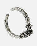 Gothic Cross Wrap Ring – hammered silver wrap ring with fleur cross, product photo on grey background
