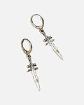 Dagger Huggie Earrings – silver dagger huggie earrings, product photo on grey background