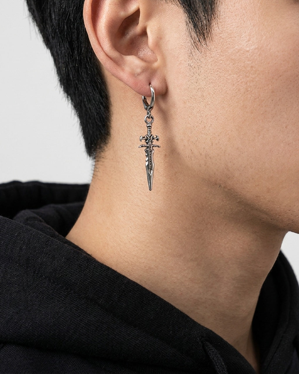Dagger Huggie Earrings worn – silver dagger huggie earrings