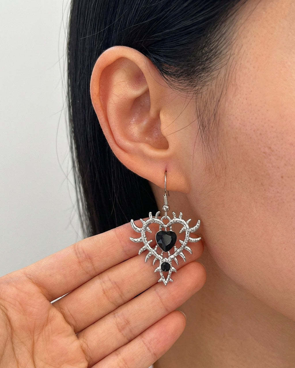 Thorn Heart Earrings worn – Black – rhinestone heart earrings in thorn frame