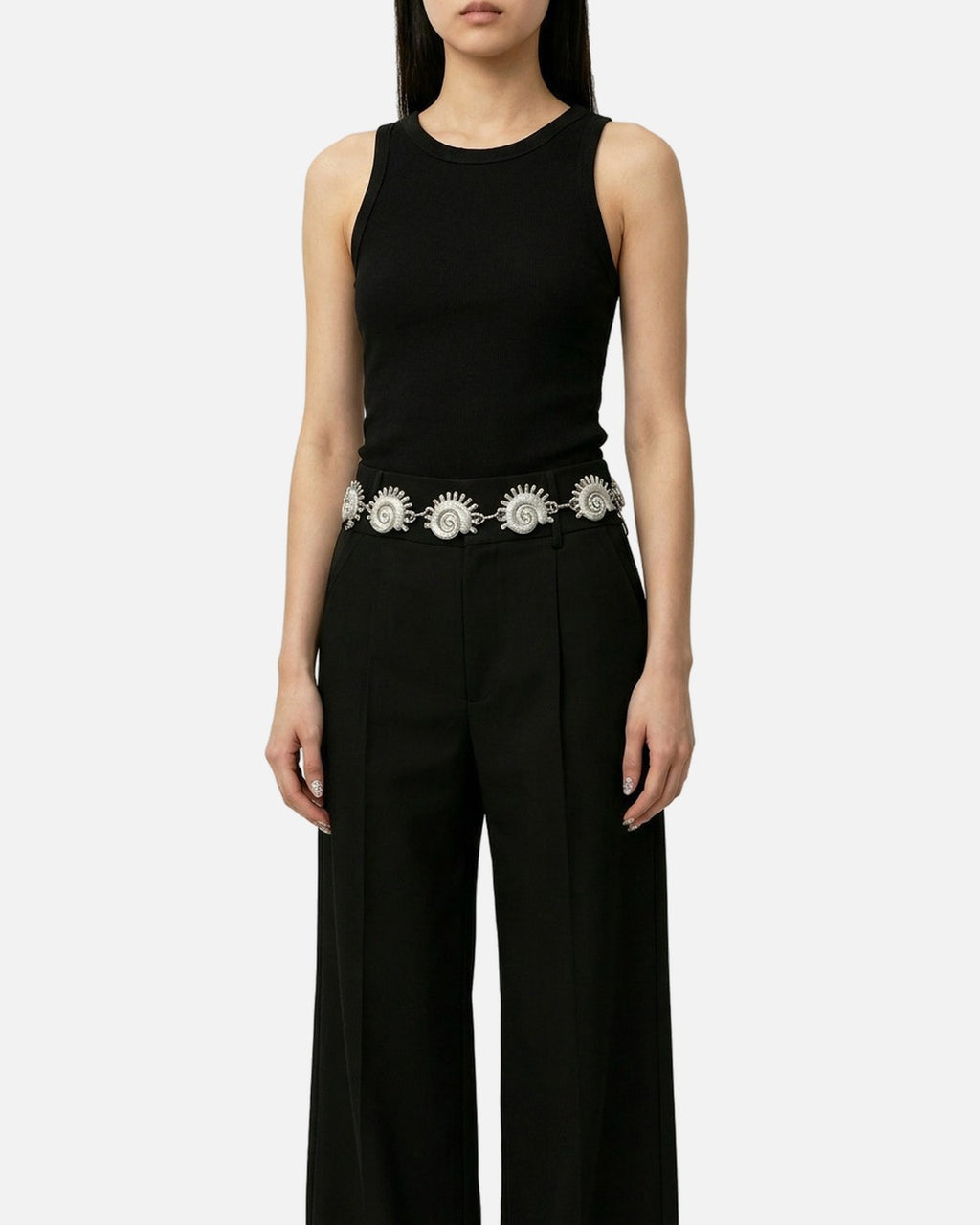 Conch Shell Waist Chain in Silver worn as a belt over a black jumpsuit