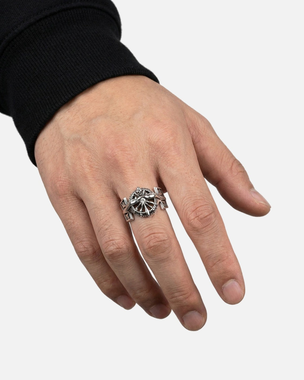 Crest Signet Ring worn on the finger – men's antique silver signet ring styled with black streetwear