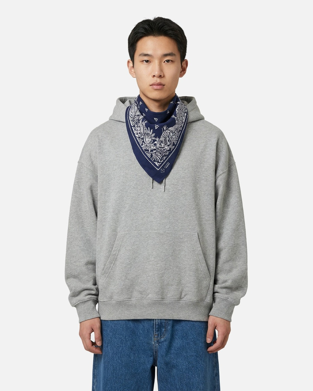 Navy Paisley Bandana worn knotted at the neck – styled with a grey hoodie and jeans