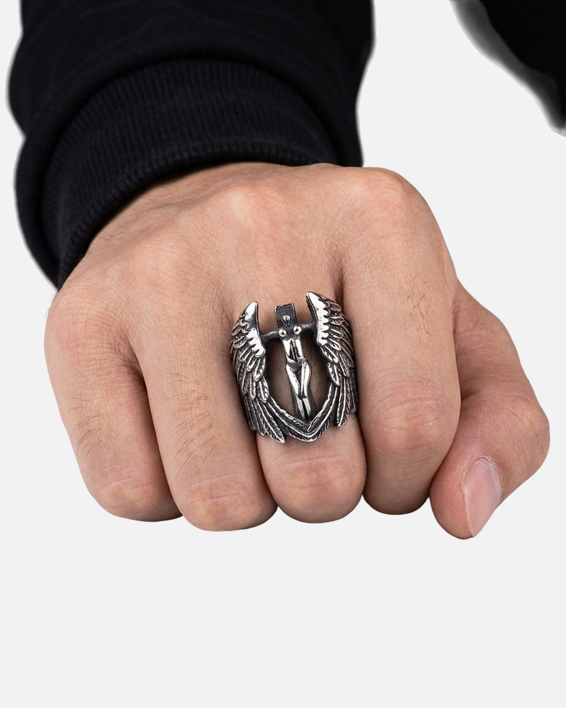 Winged Cross Ring worn on the finger – men's titanium steel ring styled with black streetwear