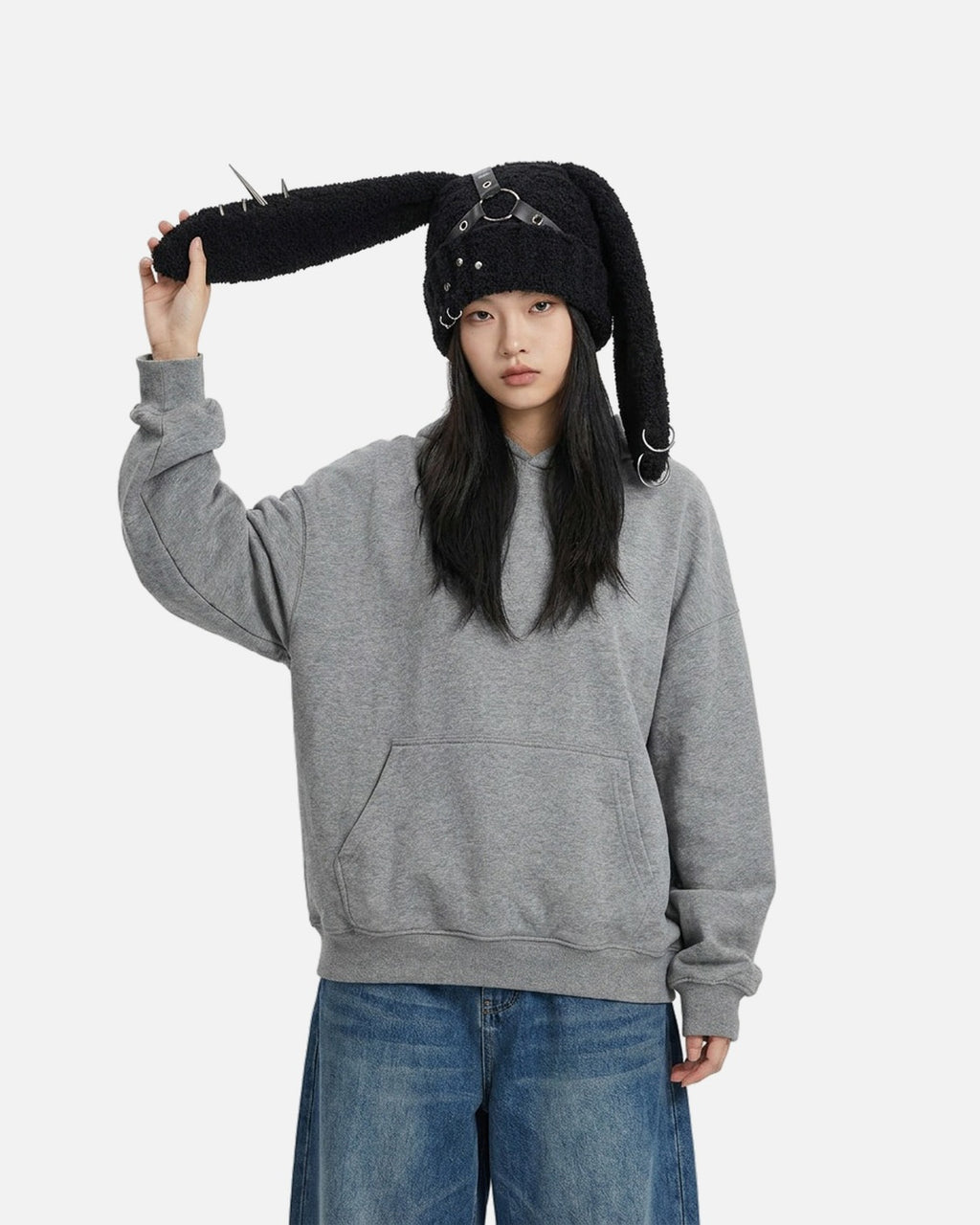 Harness Bunny Ear Hat worn – knit bunny ear hat with black harness and rivets styled in a streetwear outfit